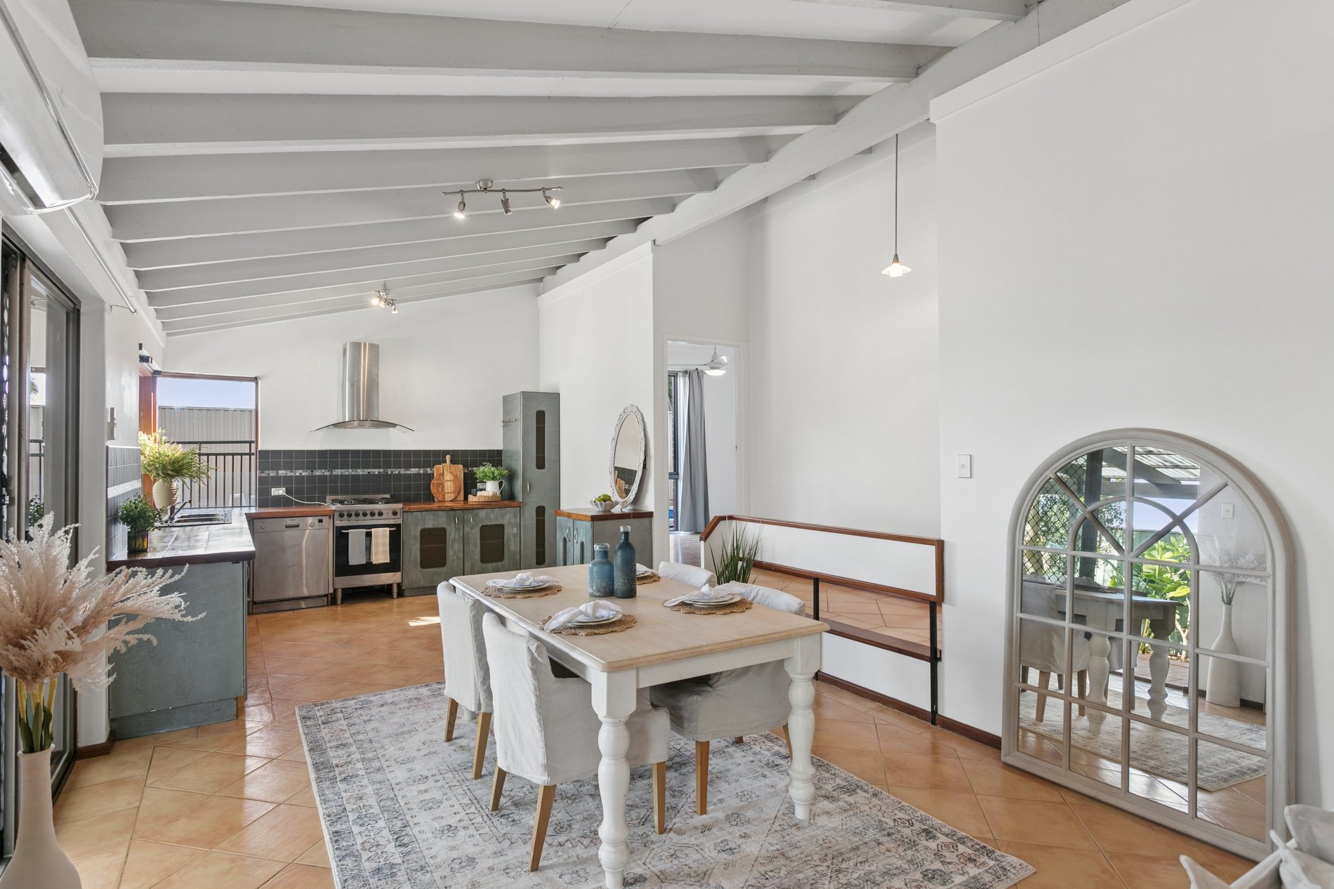 Open-plan kitchen and dining area at 3B Salata Place, Duncraig